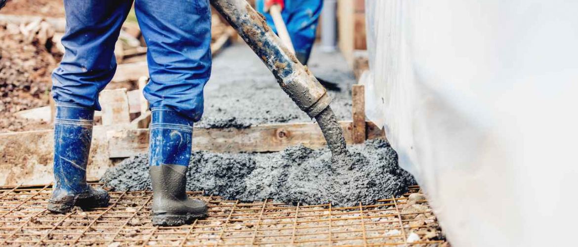 Men pouring concrete